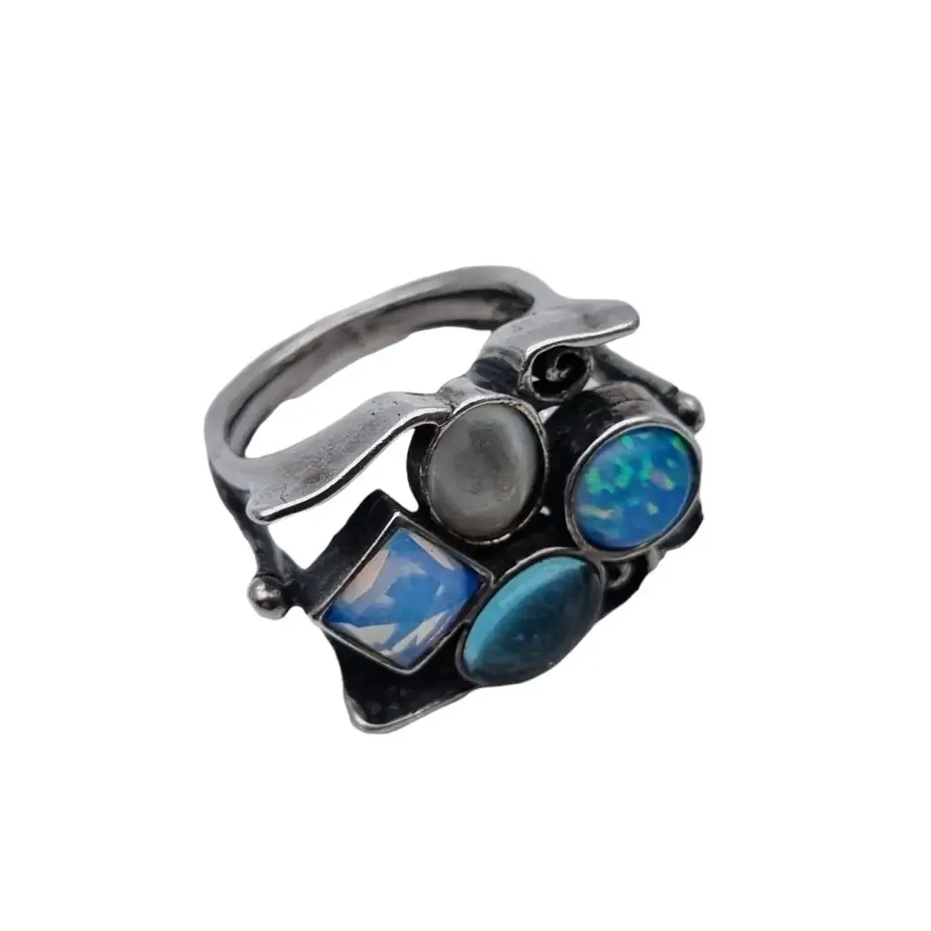 925 silver ring with blue stones of original design, large size.
