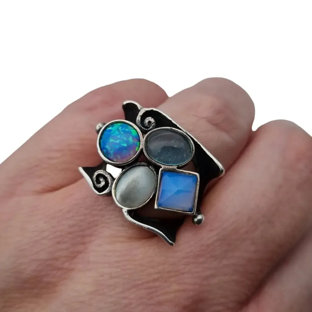 925 silver ring with blue stones of original design, large size.