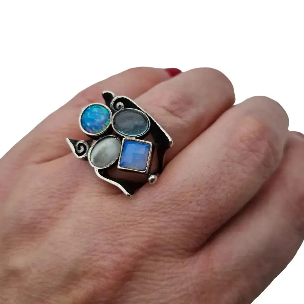 925 silver ring with blue stones of original design, large size.
