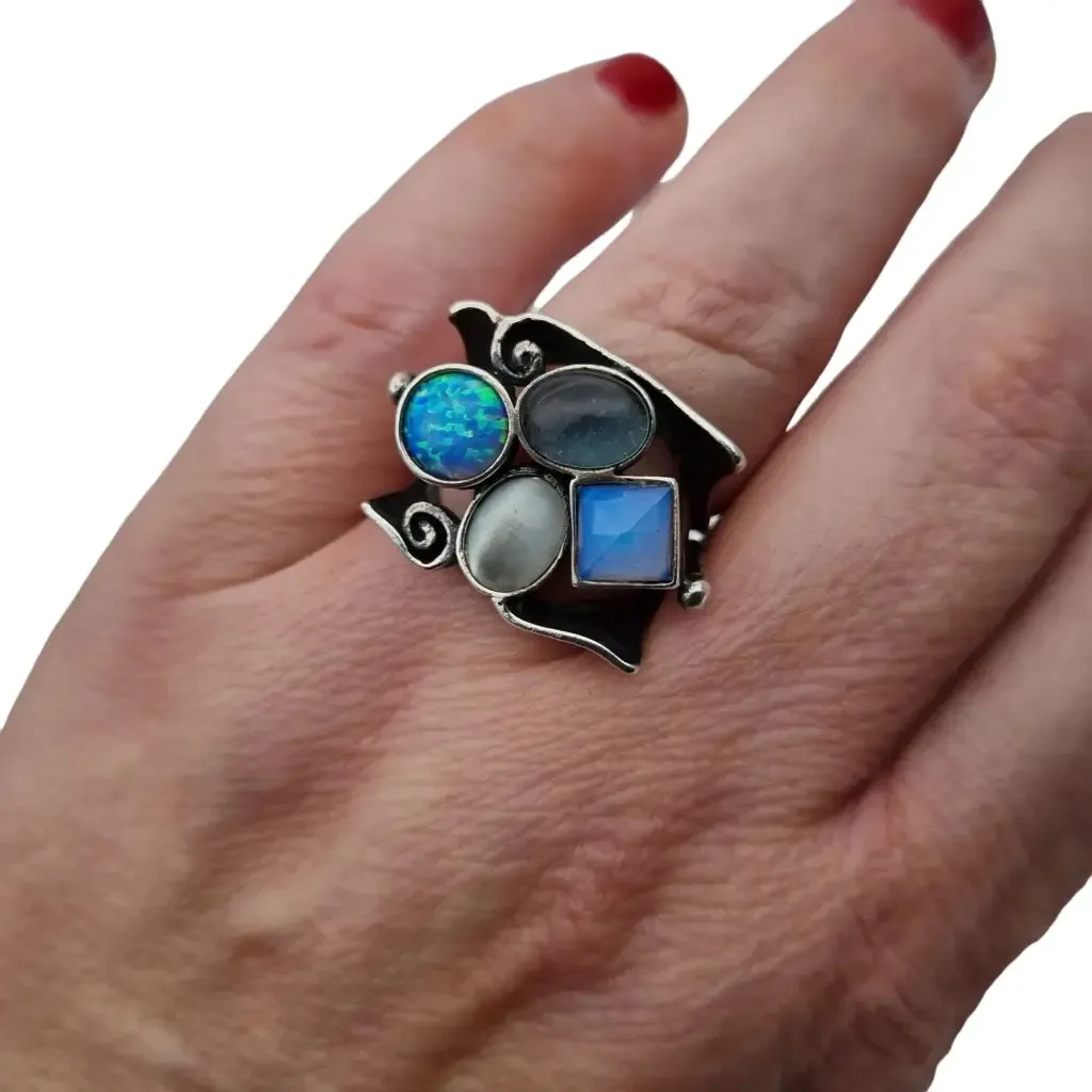 925 silver ring with blue stones of original design, large size.