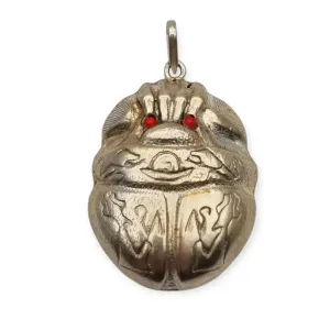 Antique Egyptian scarab amulet made of silver and hieroglyphic engravings, 1980.